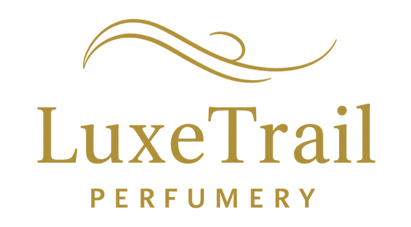 LuxeTrail Perfumery logo in gold on a white background